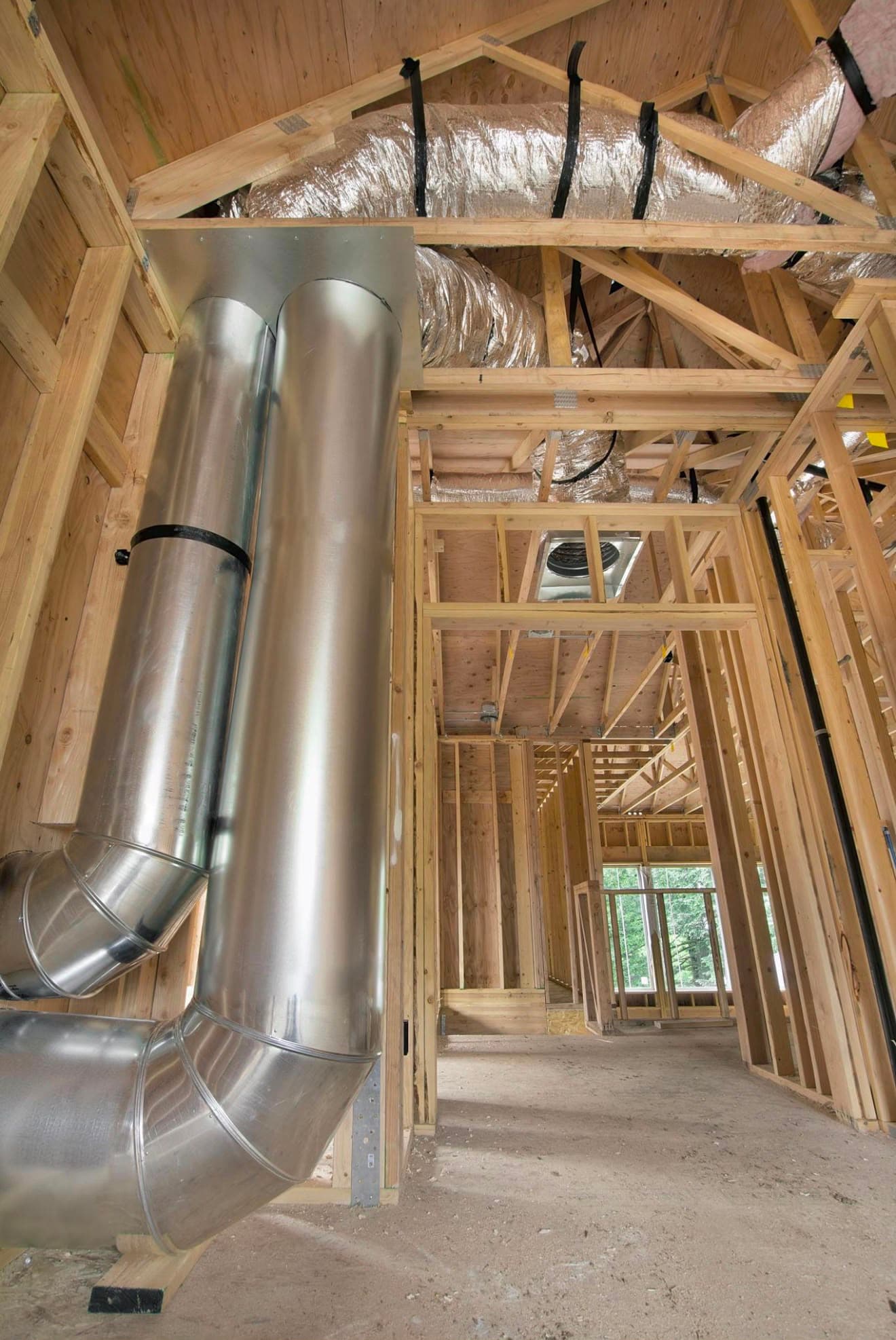 Cobros Energy Solutions technician performing air leakage inspection